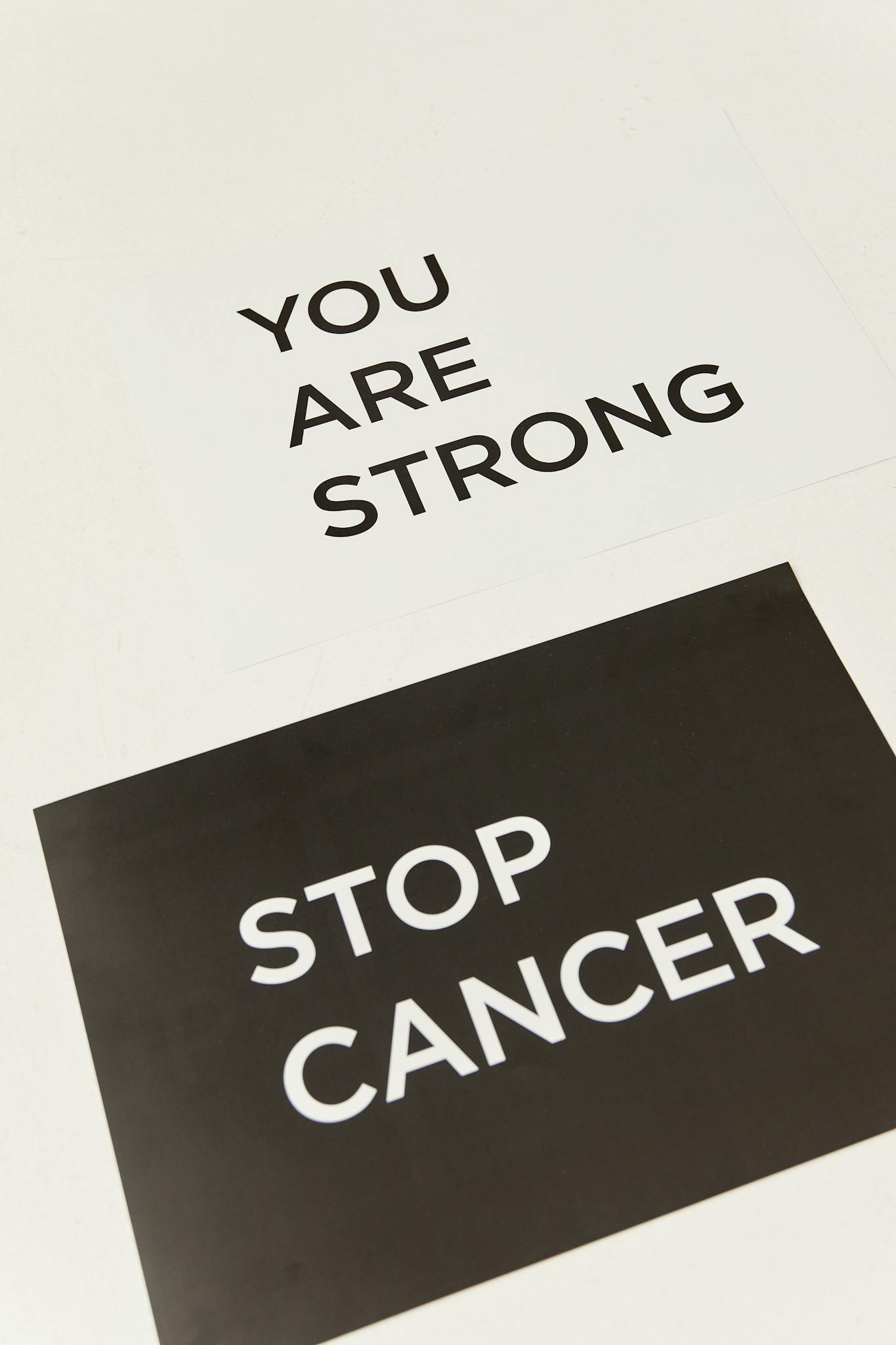 Inspirational cards with messages to support cancer awareness and strength.
